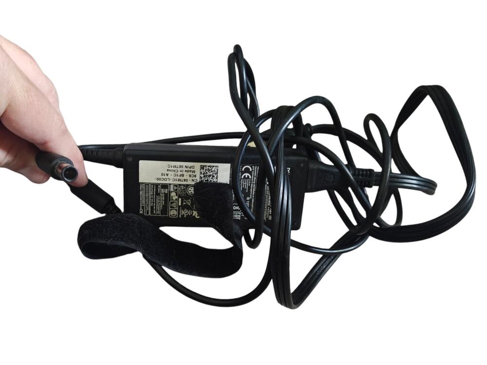 genuine Dell 65W AC power adapter (DP/N 06TM1C / 1XRN1)
